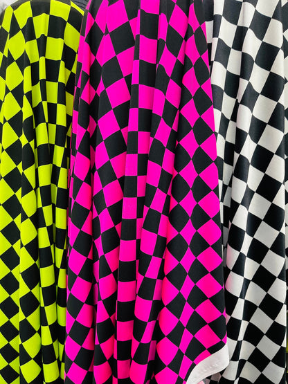 Checkers design 1” print on great quality of poly spandex 4-way stretch 58/60” Sold by the YD. Ships Worldwide from Los Angeles California