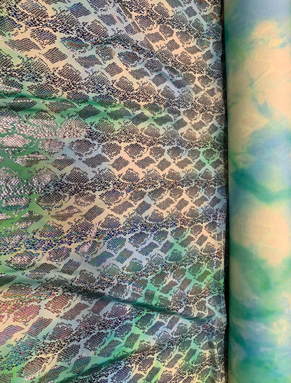 Anaconda design exotic snake skin holothin foil best quality of metallic nylon spandex 4-way stretch 58/60” Sold by the YD. Ships Worldwide