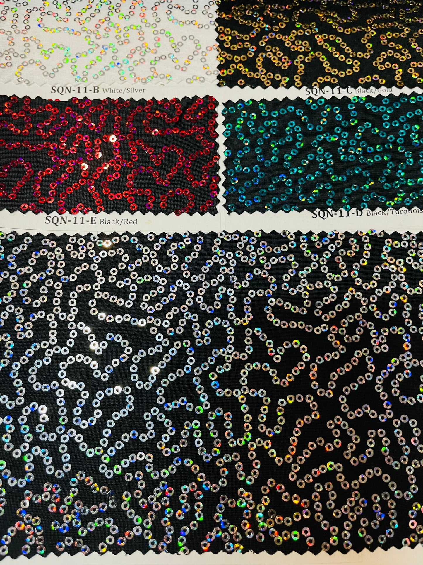 Luxury chain design hologram sequins embroidered on Spandex base 2-way stretch 58/60” Sold by the YD. Ships Worldwide from Los Angeles CA.