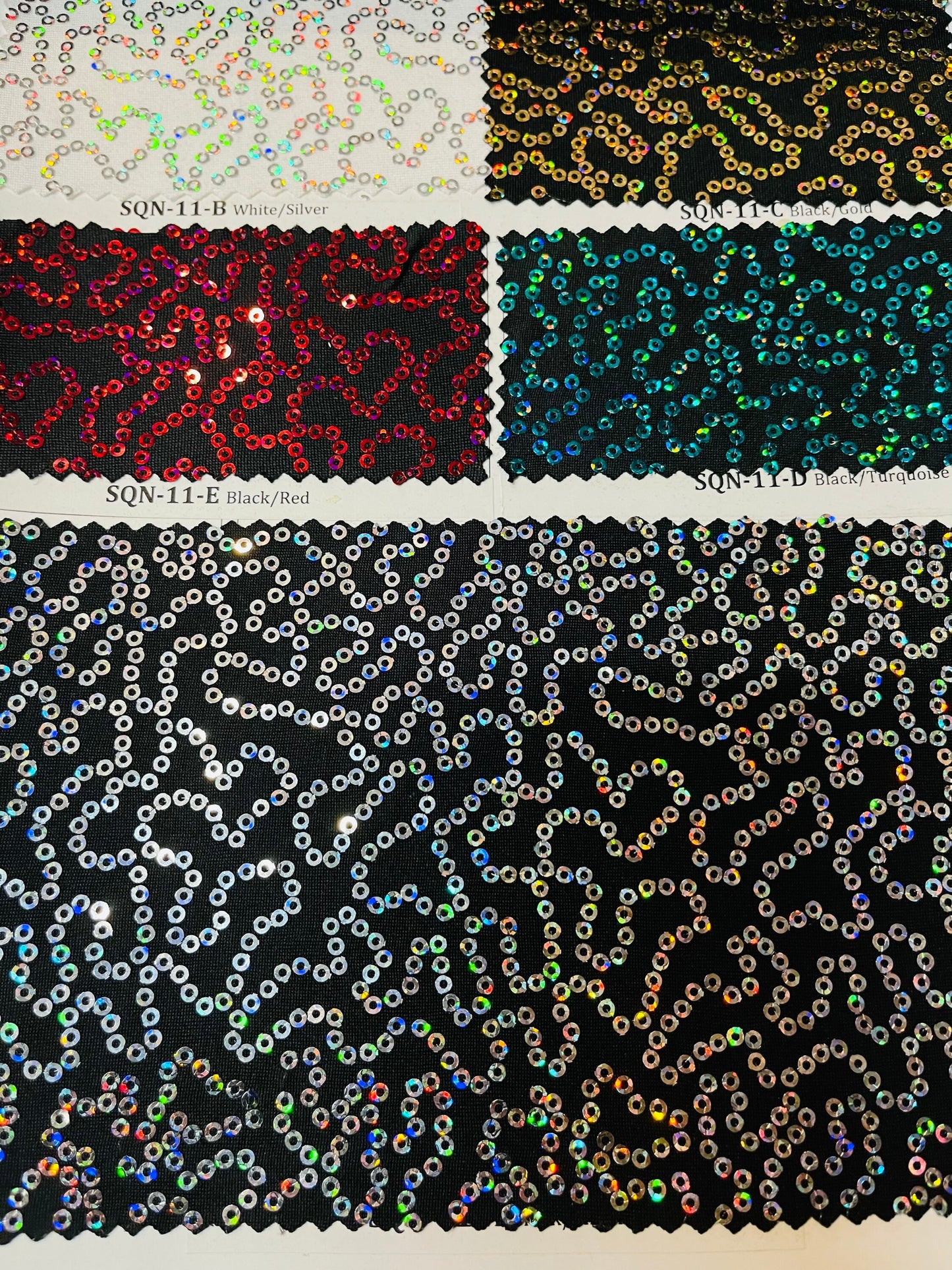 Luxury chain design hologram sequins embroidered on Spandex base 2-way stretch 58/60” Sold by the YD. Ships Worldwide from Los Angeles CA.