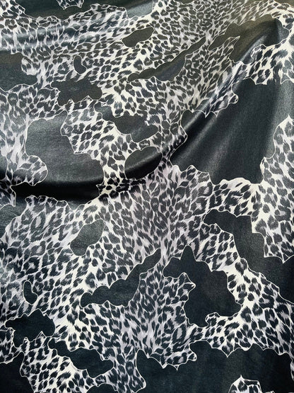 Exotic animal print design metallic poly Soandex 2-way stretch 58/60” Sold by the YD. Ships Worldwide from Los Angeles California USA.