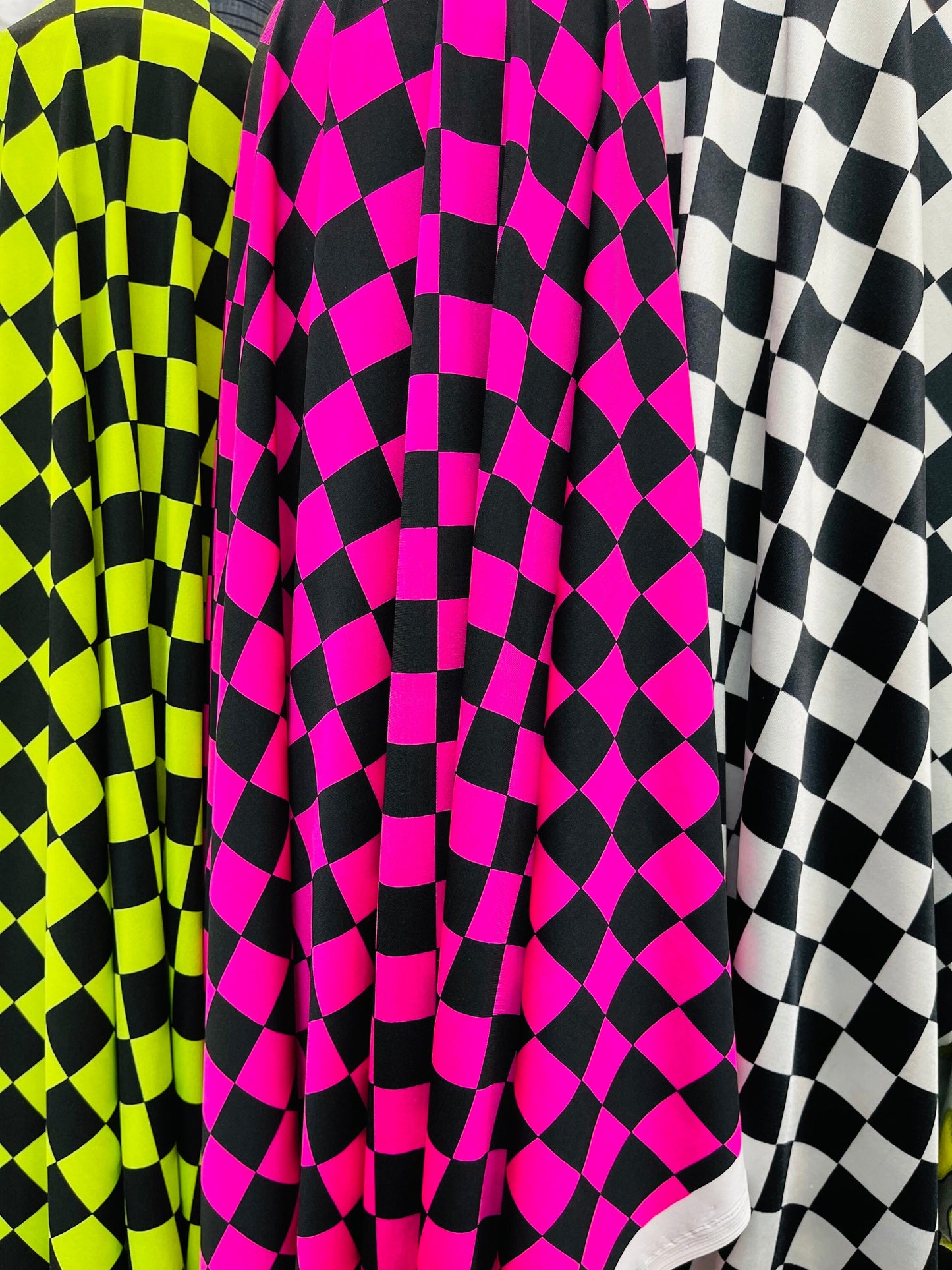 Checkers design 1” print on great quality of poly spandex 4-way stretch 58/60” Sold by the YD. Ships Worldwide from Los Angeles California