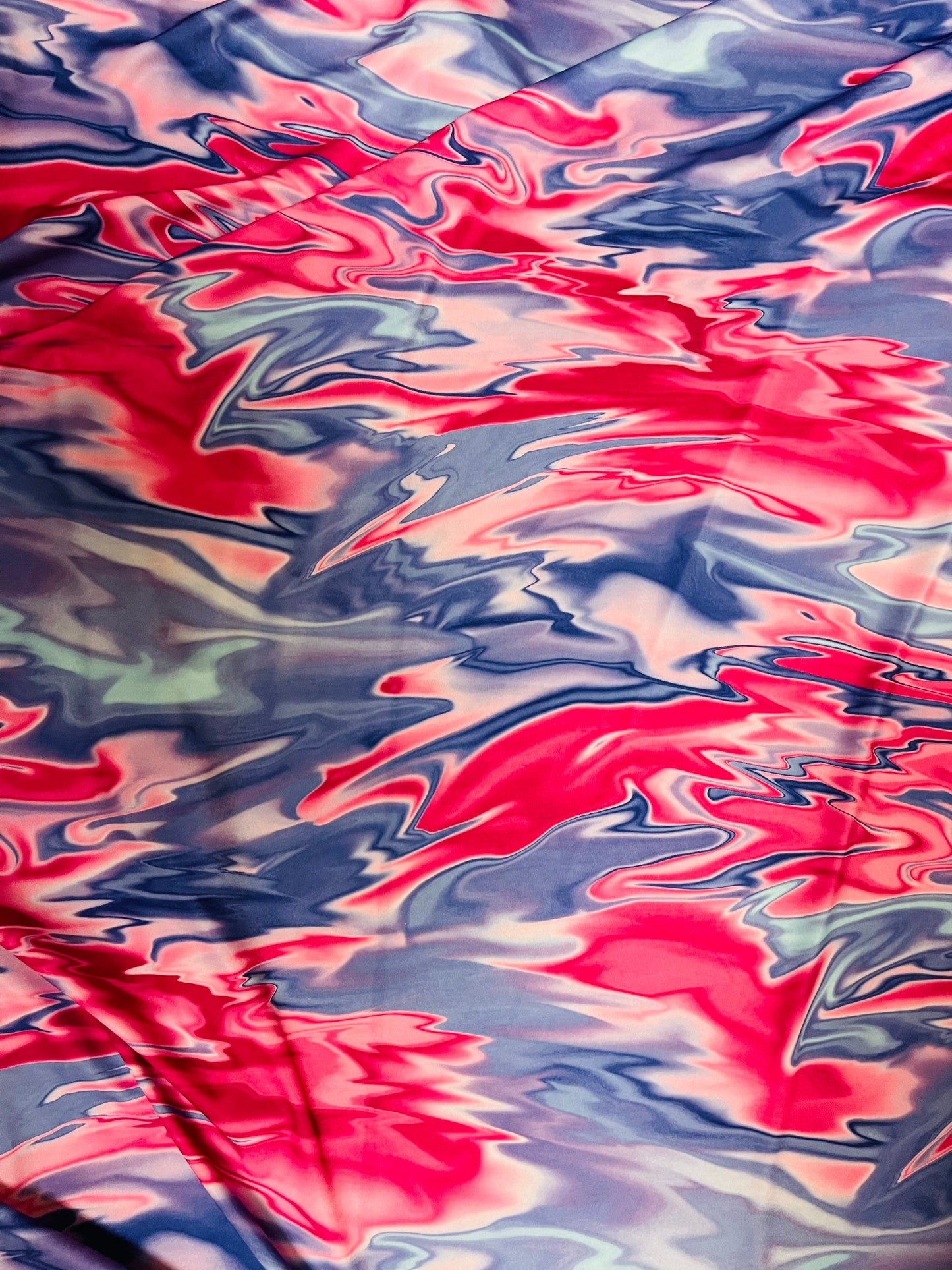 New Marble Liquid design Red/Magenta/Blue print on best quality of nylon spandex 4-way stretch 58/60” Sold by the YD. Ships Worldwide