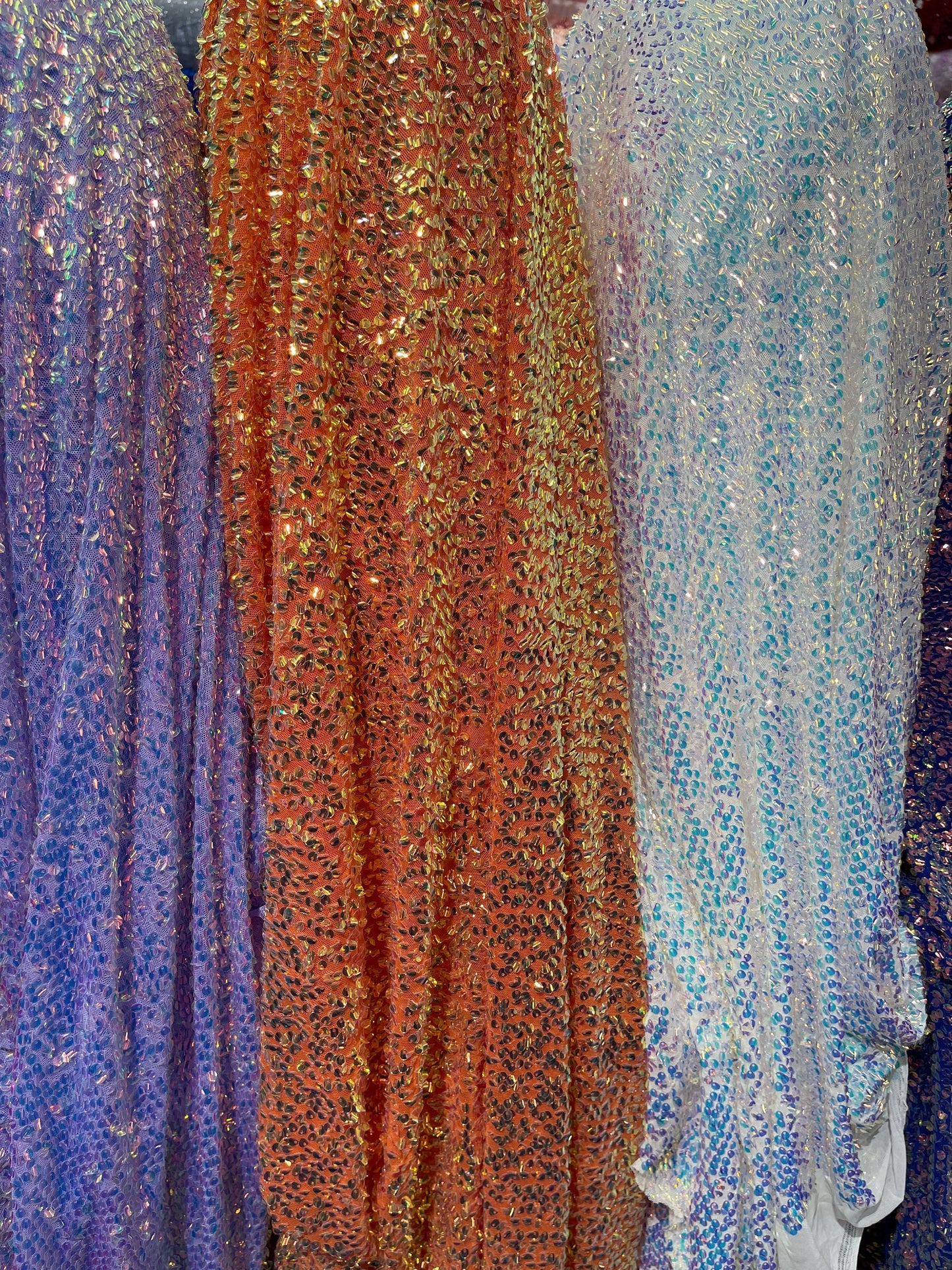 New Luxury iridescent sequins embroidered on 4-way stretch mesh 55/57” Sold by the YD. Ships Worldwide from Los Angeles California USA.