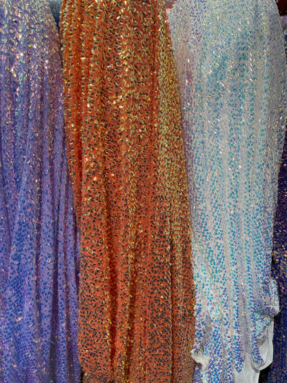 New Luxury iridescent sequins embroidered on 4-way stretch mesh 55/57” Sold by the YD. Ships Worldwide from Los Angeles California USA.