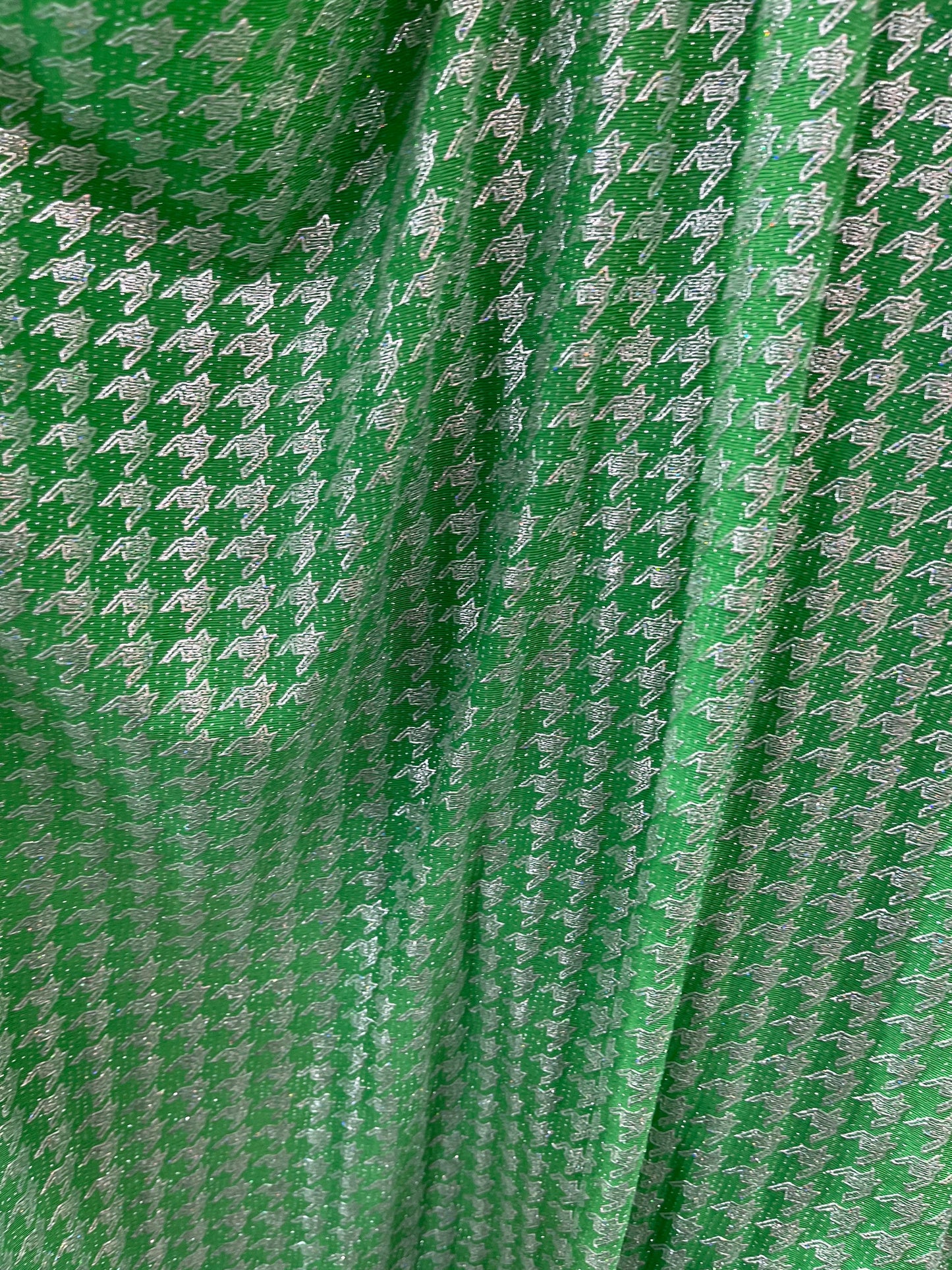 New metallic houndstooth design print on poly spandex 2-way stretch 58/60” Sold by the YD. Ships Worldwide from Los Angeles California USA.