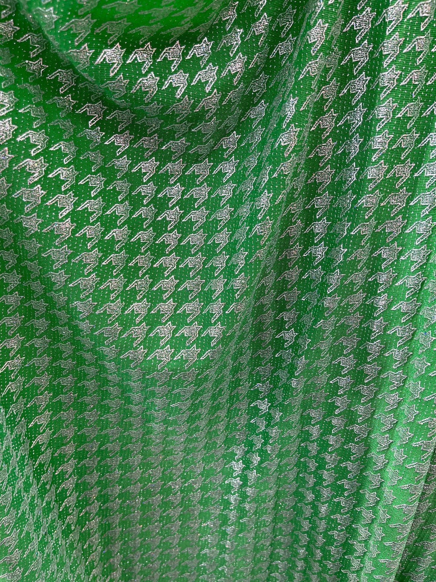 New metallic houndstooth design print on poly spandex 2-way stretch 58/60” Sold by the YD. Ships Worldwide from Los Angeles California USA.