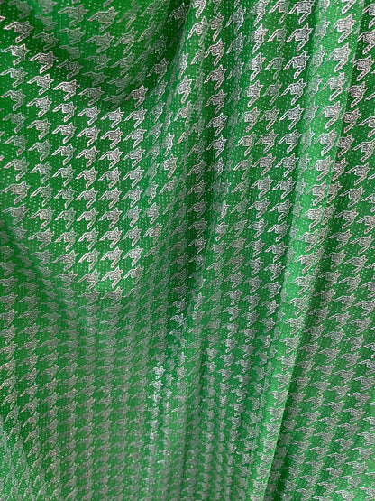 New metallic houndstooth design print on poly spandex 2-way stretch 58/60” Sold by the YD. Ships Worldwide from Los Angeles California USA.