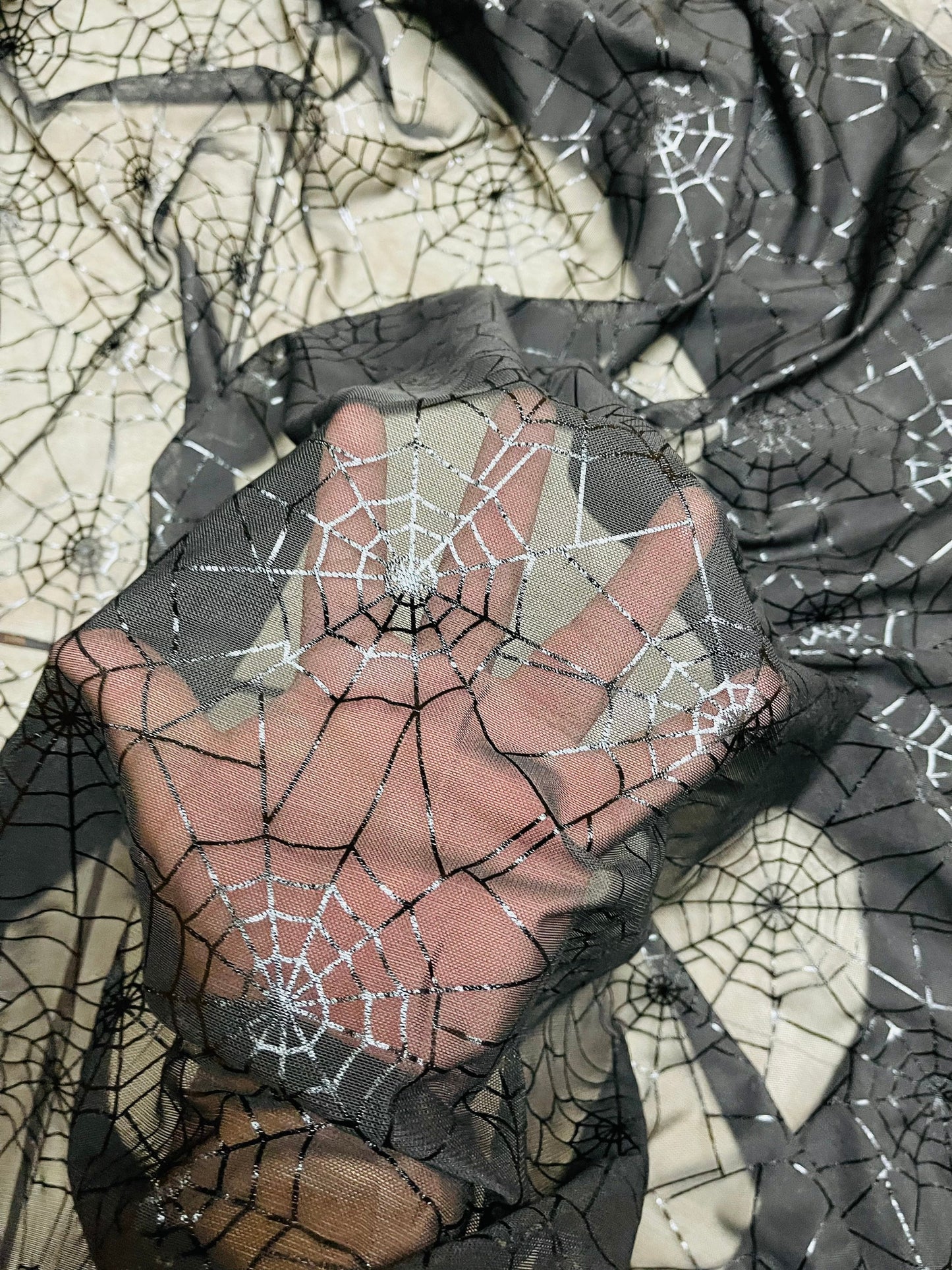 Spiderweb Design metallic Nylon Spandex Mesh With Foil 4-way stretch 58/60" Sold by the YD. Ships worldwide from Los Angeles California USA.