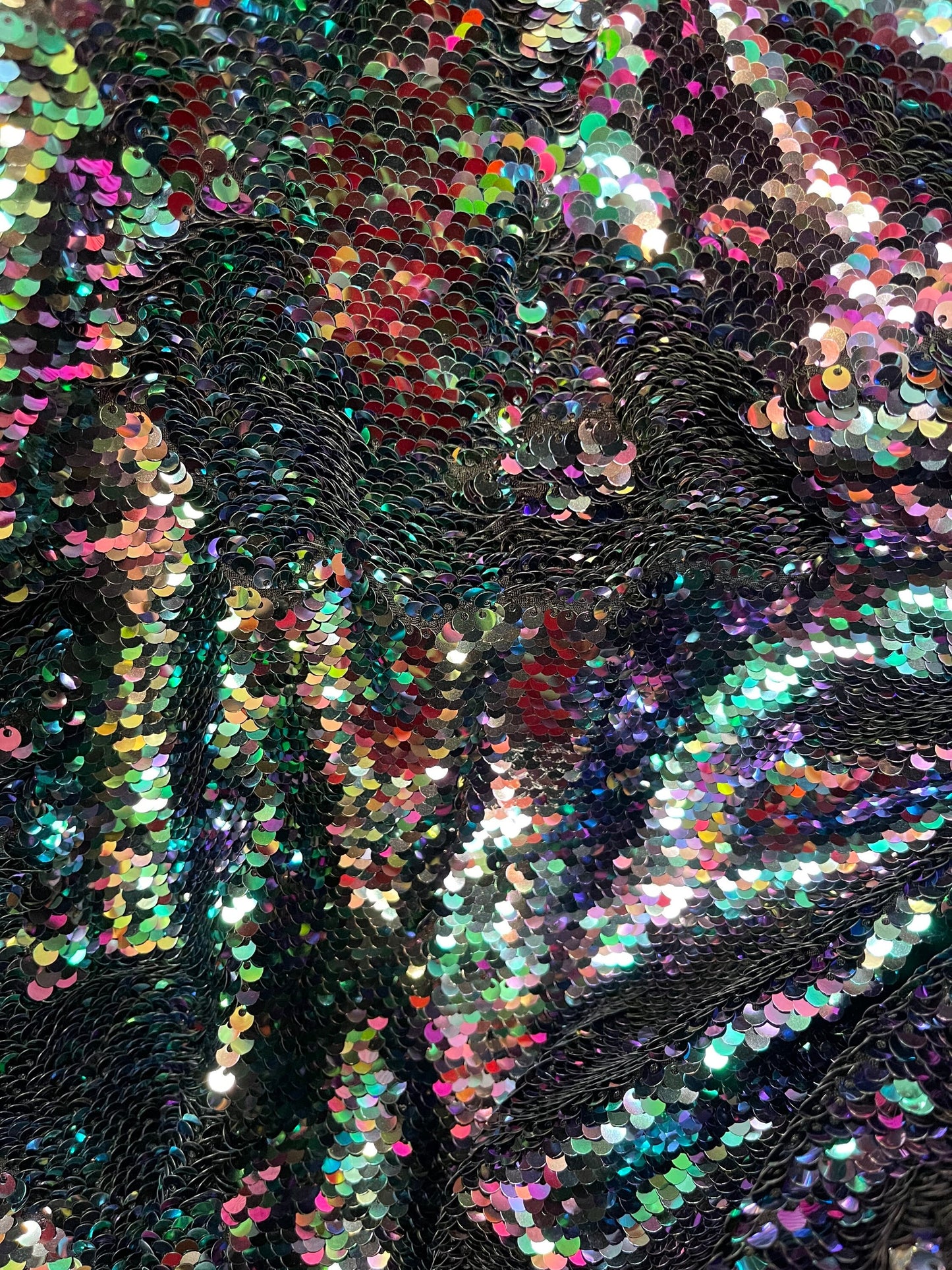 Reversible sequins Iridescent pewter mermaid sequins on spandex base 2-way stretch 58/60” Sold by the YD. Ships Worldwide from Los Angeles