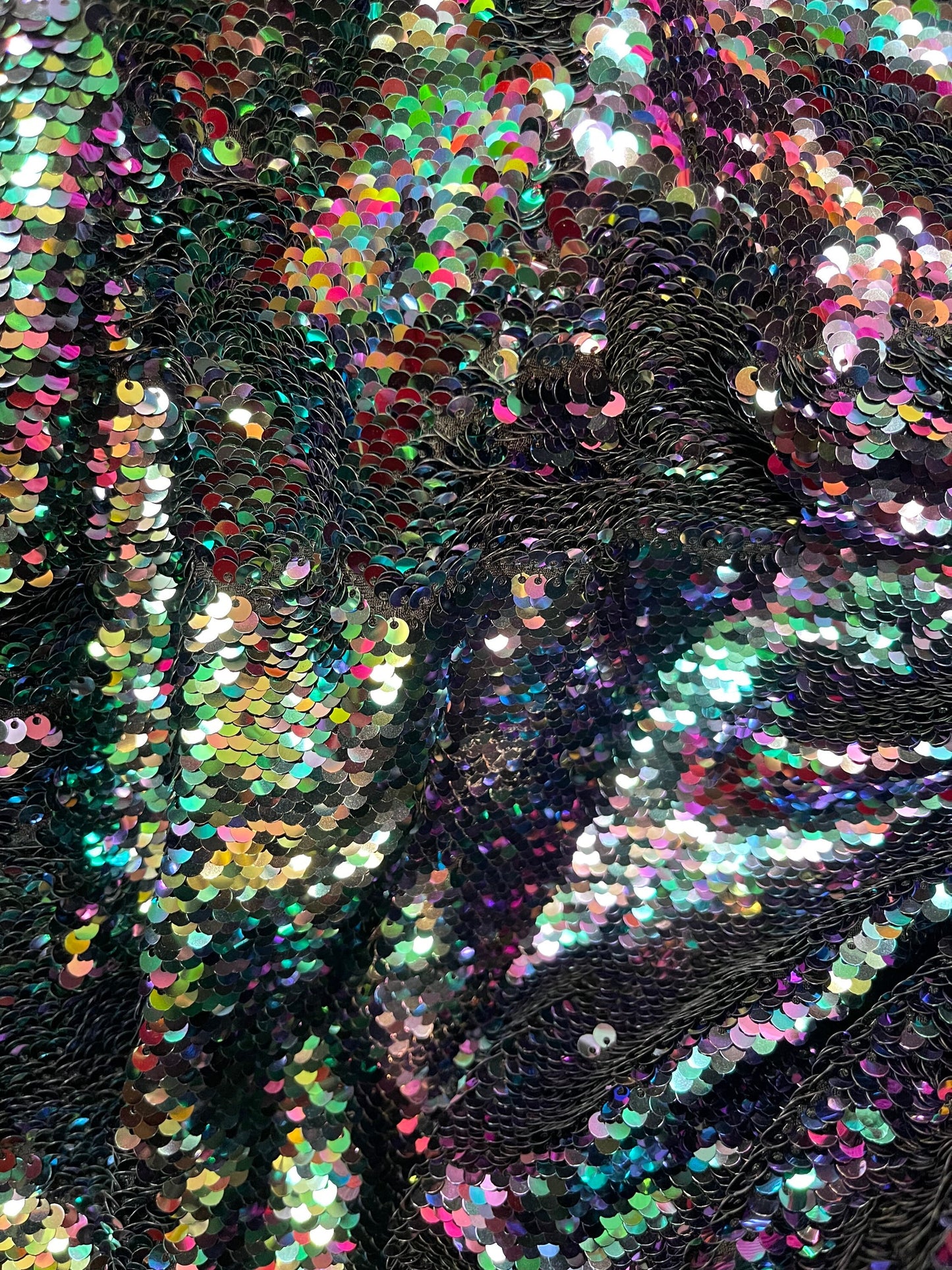 Reversible sequins Iridescent pewter mermaid sequins on spandex base 2-way stretch 58/60” Sold by the YD. Ships Worldwide from Los Angeles