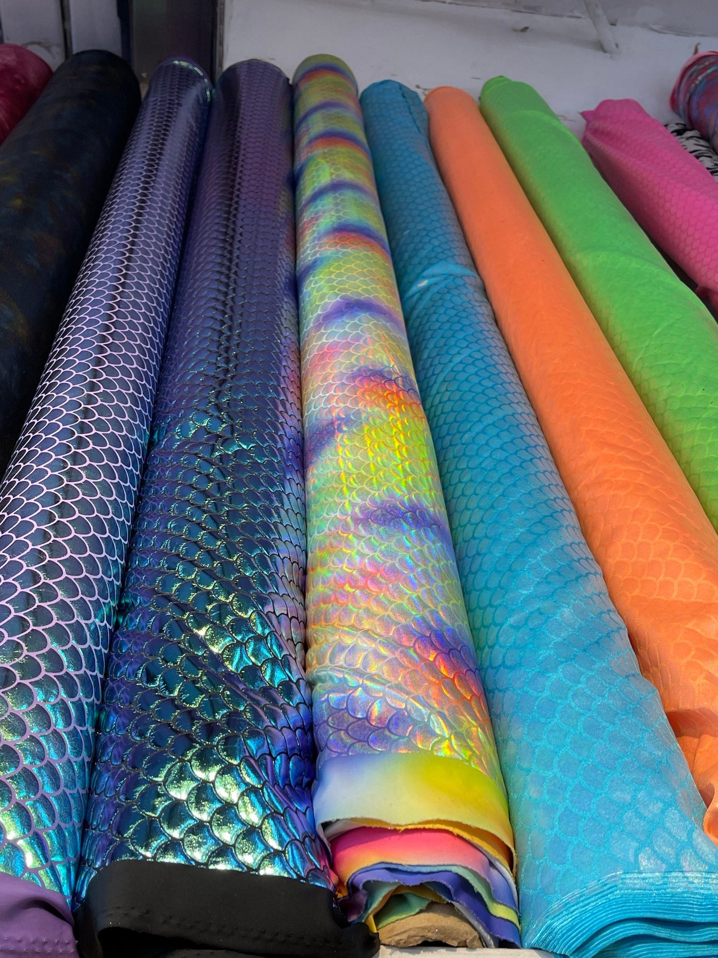 Mermaid design iridescent metallic nylon spandex 4-way stretch 58/60” Sold by the YD. Ships Worldwide from Los Ángeles California USA.