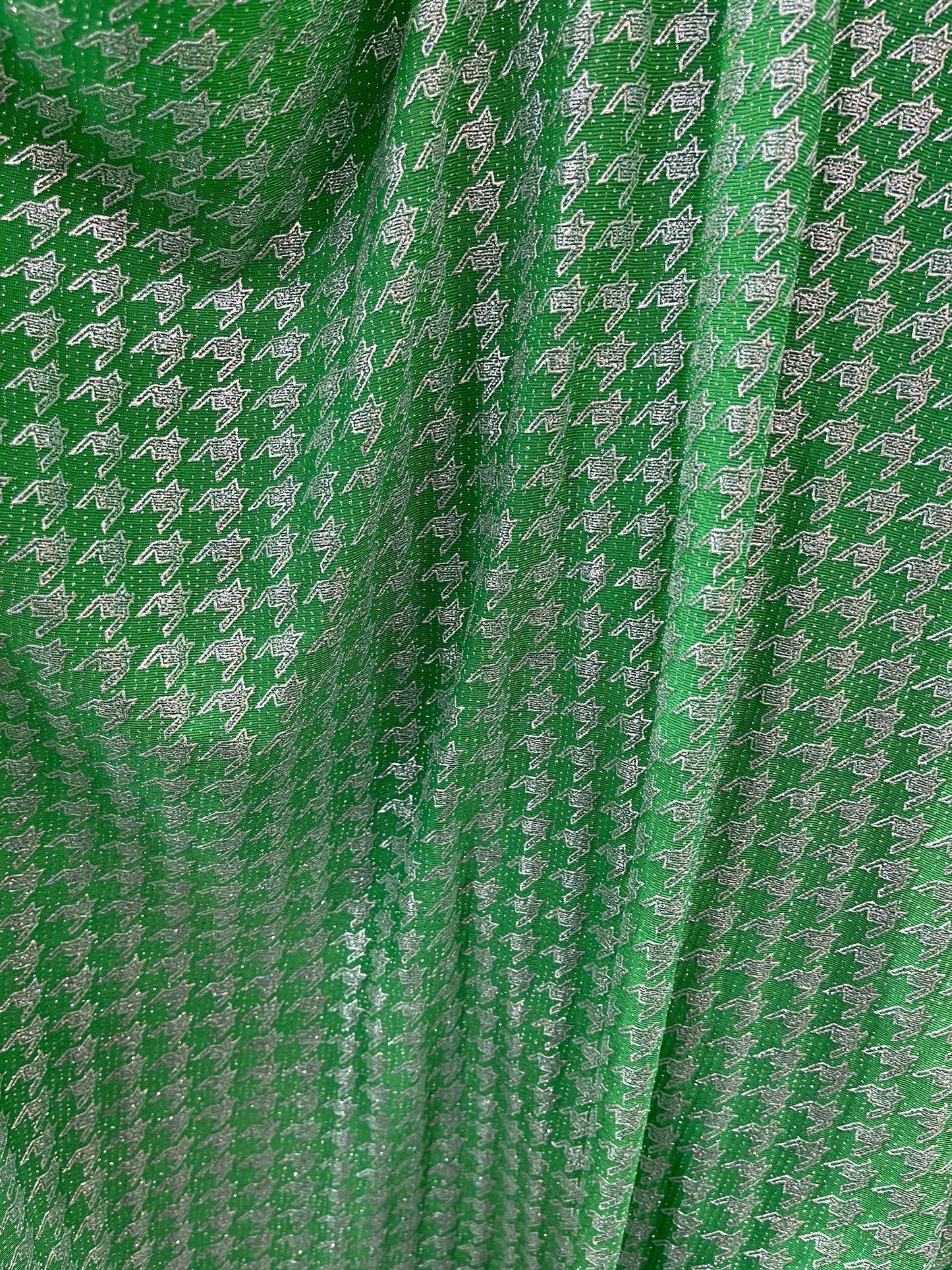 New metallic houndstooth design print on poly spandex 2-way stretch 58/60” Sold by the YD. Ships Worldwide from Los Angeles California USA.