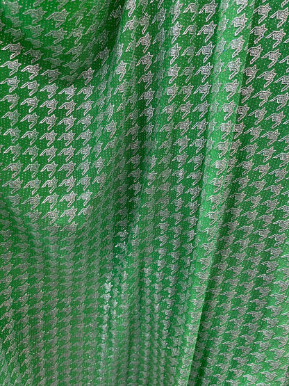 New metallic houndstooth design print on poly spandex 2-way stretch 58/60” Sold by the YD. Ships Worldwide from Los Angeles California USA.