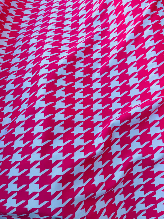 Houndstooth design Hot pink/White print on great quality of nylon spandex  4-way stretch 58/60” Sold by the YD. Ships worldwide from L.A CA