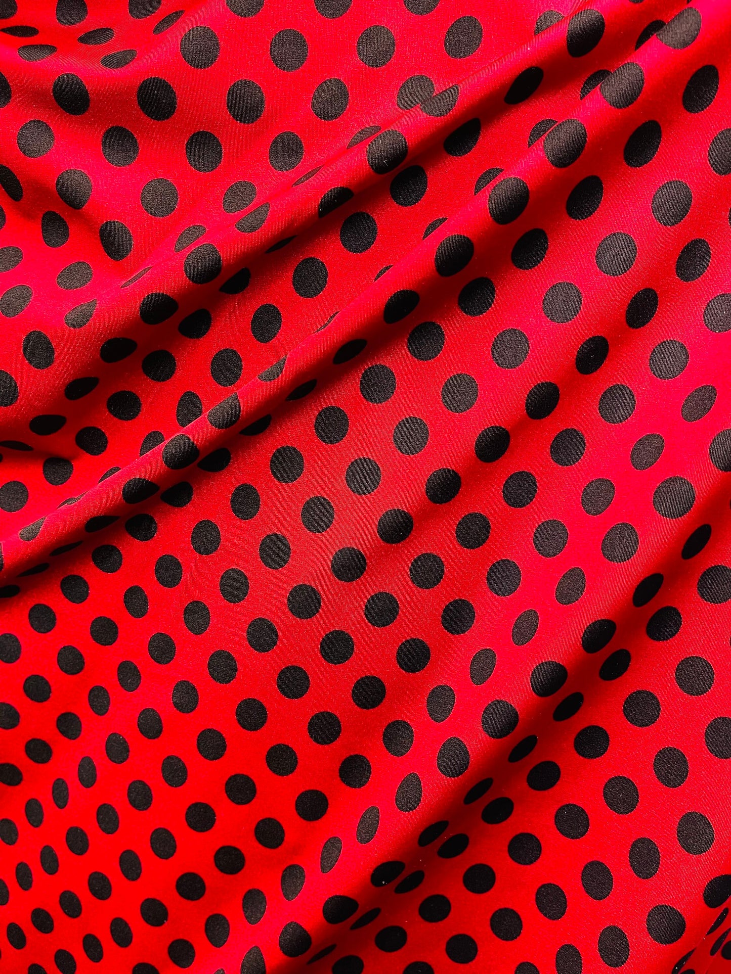 Polka dots design print on best quality of Nylon spandex 4-way stretch 58/60” Sold by the YD. Ships Worldwide from Los Angeles California US