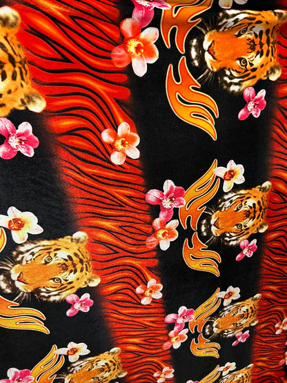 Tiger design Exotic animal print on best quality of stretch velvet 4-way stretch 58/60” Sold by the YD. Ships worldwide from Los Angeles CA