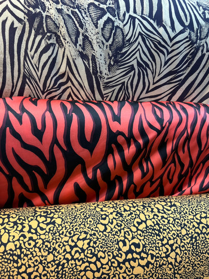 Exotics  Multi animal print spandex 4-way stretch 58/60” Sold by the YD. Ships worldwide from Los Angeles California USA.