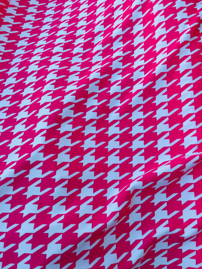 Houndstooth design Hot pink/White print on great quality of nylon spandex  4-way stretch 58/60” Sold by the YD. Ships worldwide from L.A CA