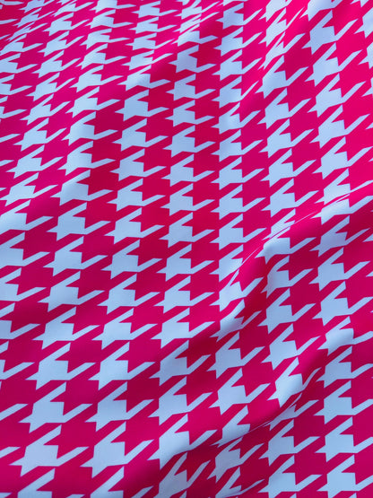 Houndstooth design Hot pink/White print on great quality of nylon spandex  4-way stretch 58/60” Sold by the YD. Ships worldwide from L.A CA