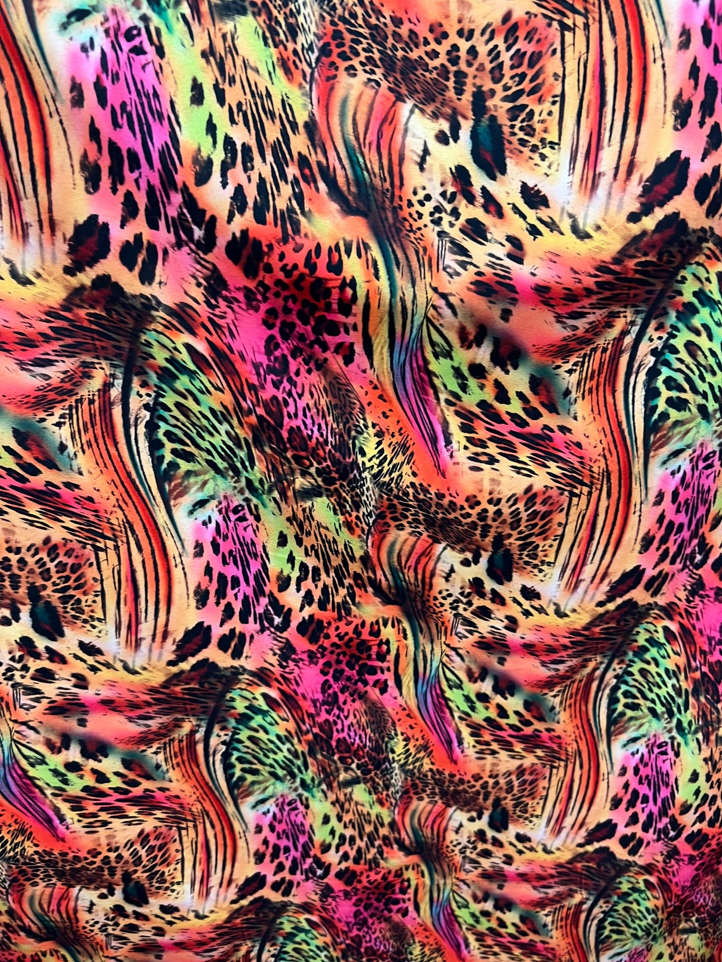 New exotic animal print multicolor print on great quality of nylon spandex 4-way stretch 58/60” Sold by the YD. Ships worldwide from L.A