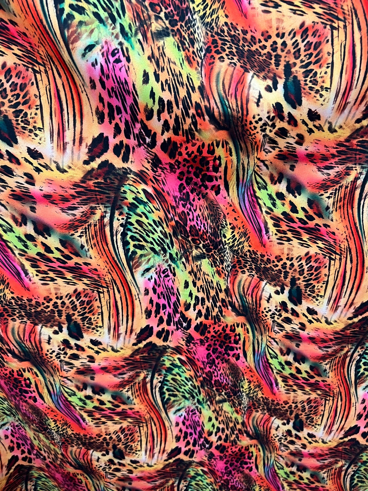 New exotic animal print multicolor print on great quality of nylon spandex 4-way stretch 58/60” Sold by the YD. Ships worldwide from L.A