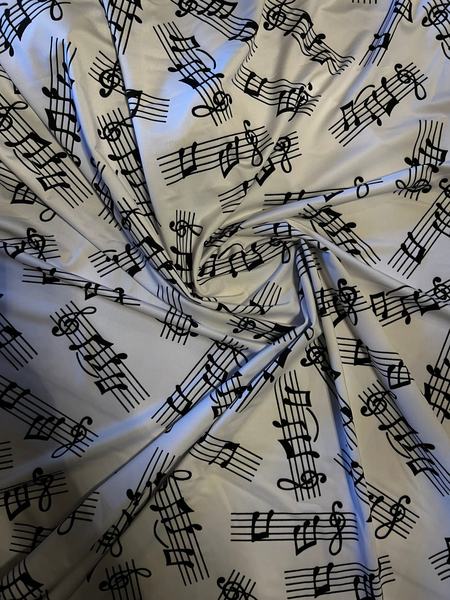 Music Notes design print on great quality of nylon spandex 4-way stretch 58/60” Sold by the YD. Ships Worldwide from Los Angeles California