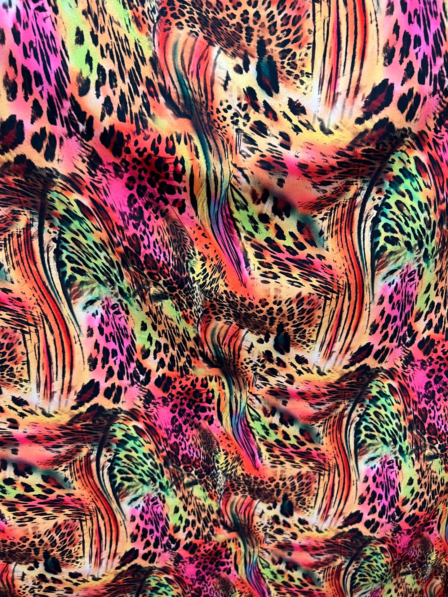 New exotic animal print multicolor print on great quality of nylon spandex 4-way stretch 58/60” Sold by the YD. Ships worldwide from L.A