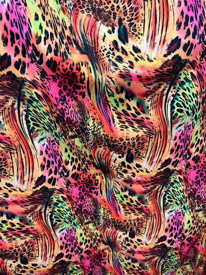 New exotic animal print multicolor print on great quality of nylon spandex 4-way stretch 58/60” Sold by the YD. Ships worldwide from L.A