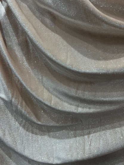 Silver Glitter on stretch velvet 420 GSM  4-way stretch 58/60” Sold by the YD. Ships Worldwide from Los Angeles California USA.