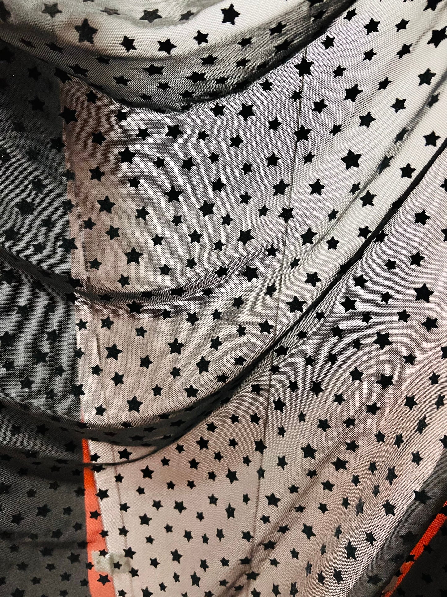 New Stars design flocking stars on stretch power mesh 4-way 58/60” Sold by the YD. Ships Worldwide from Los Ángeles California USA.