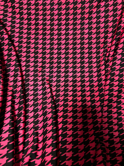 New houndstooth design hot pink/black print on poly spandex 4way stretch 58/60" Sold by the YD. Ships worldwide from Los Angeles California.