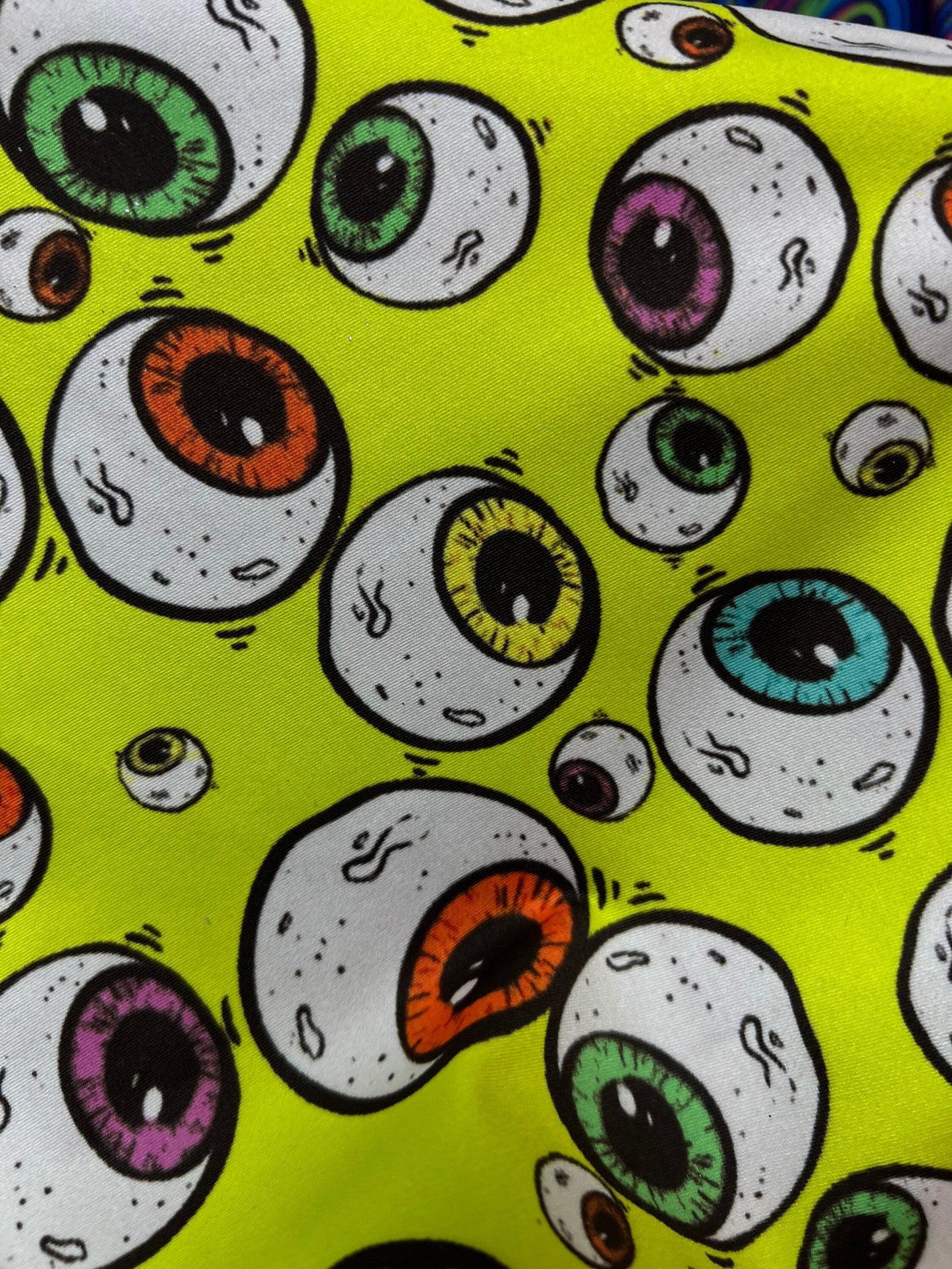 New Multicolor Falling Eyeballs design print on poly spandex 4-way stretch 58/60” Sold by the YD. Ships Worldwide from Los Angeles CA