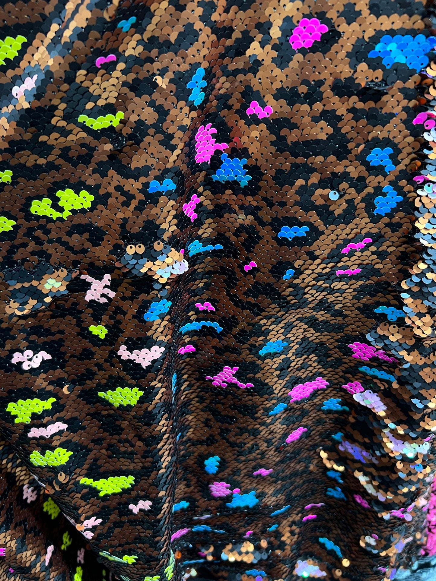 New Exotic leopard on sequins with neon colors 2-way stretch mesh base 55/57” Sold by the YD. Ships Worldwide from Los Angeles California US