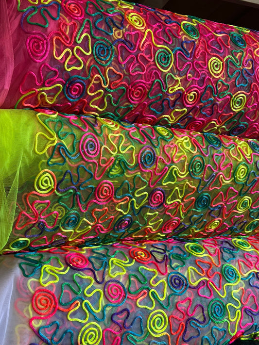 Embroidery rainbow lace swirl design 2-way stretch 55/57” Sold by the YD. Ships Worldwide from Los Angeles California USA.