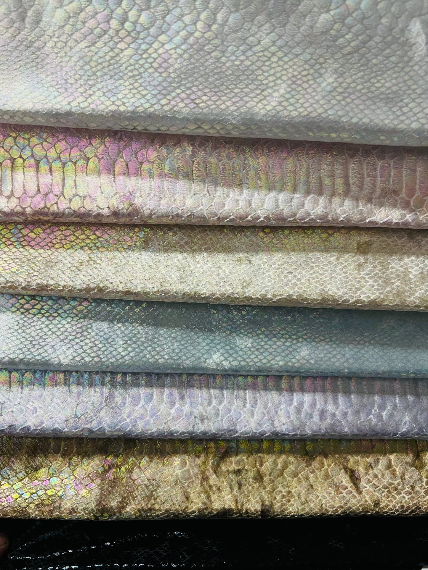 Ilusión Anaconda design crystal iridescent foil on great quality of stretch velvet 4-way stretch 58/60” Sold by the YD. Ships Worldwide