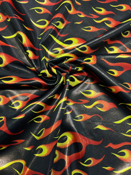 Hot flames design metallic nylon spandex 4-way stretch 58/60” Sold by the YD. Ships Worldwide from Los Angeles California USA.