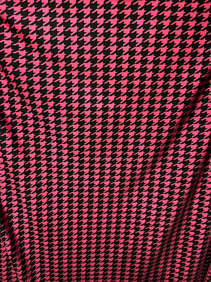 New houndstooth design hot pink/black print on poly spandex 4way stretch 58/60" Sold by the YD. Ships worldwide from Los Angeles California.