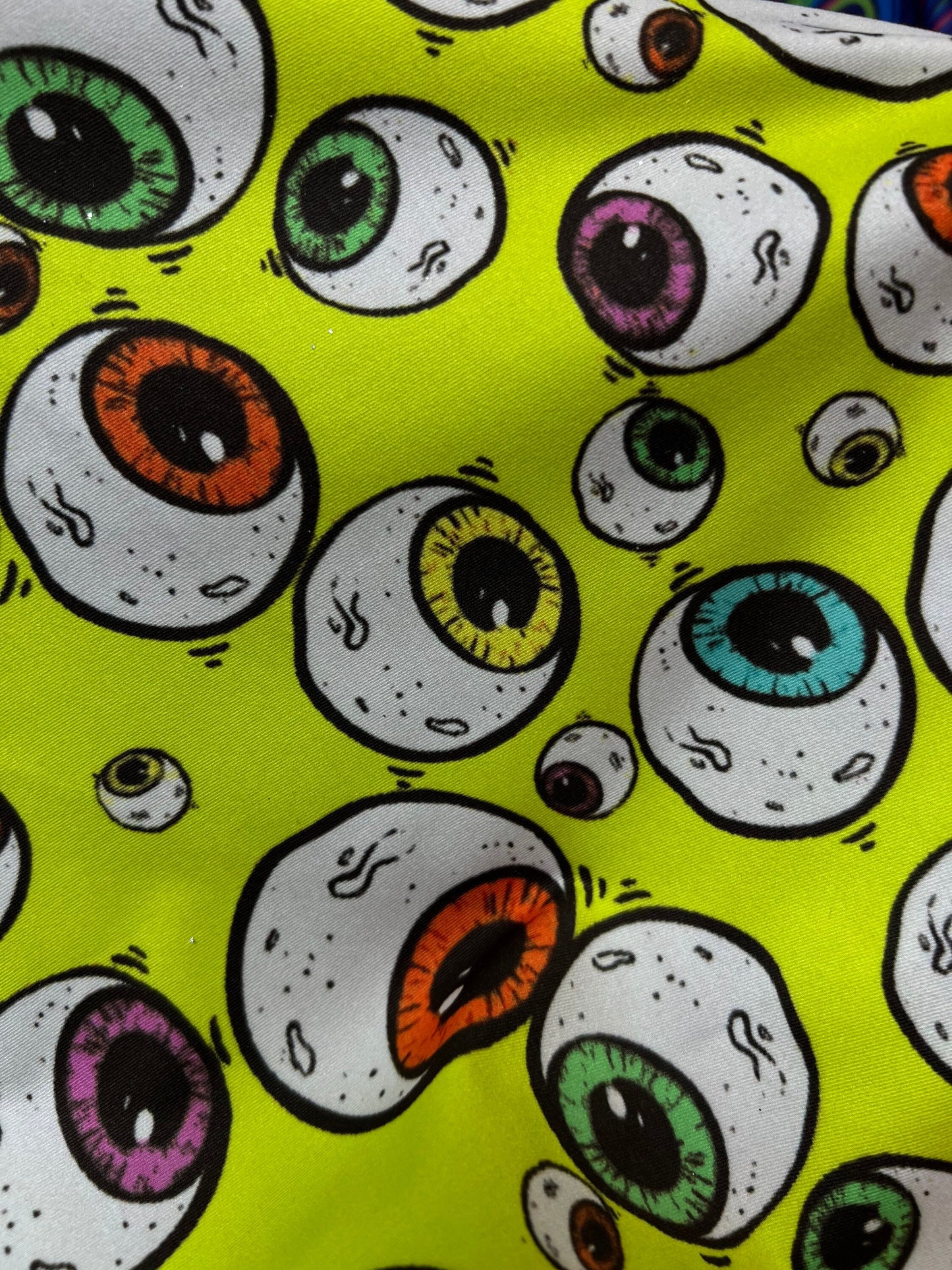 New Multicolor Falling Eyeballs design print on poly spandex 4-way stretch 58/60” Sold by the YD. Ships Worldwide from Los Angeles CA