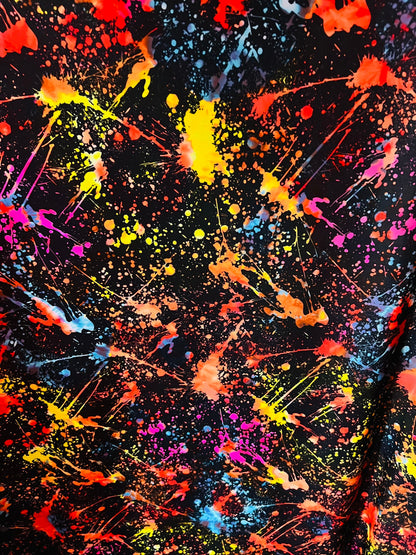 New splatter paint design Black/Multicolor print on nylon spandex 4-way stretch 58/60” Sold by the YD. Ships worldwide from Los Angeles Cali