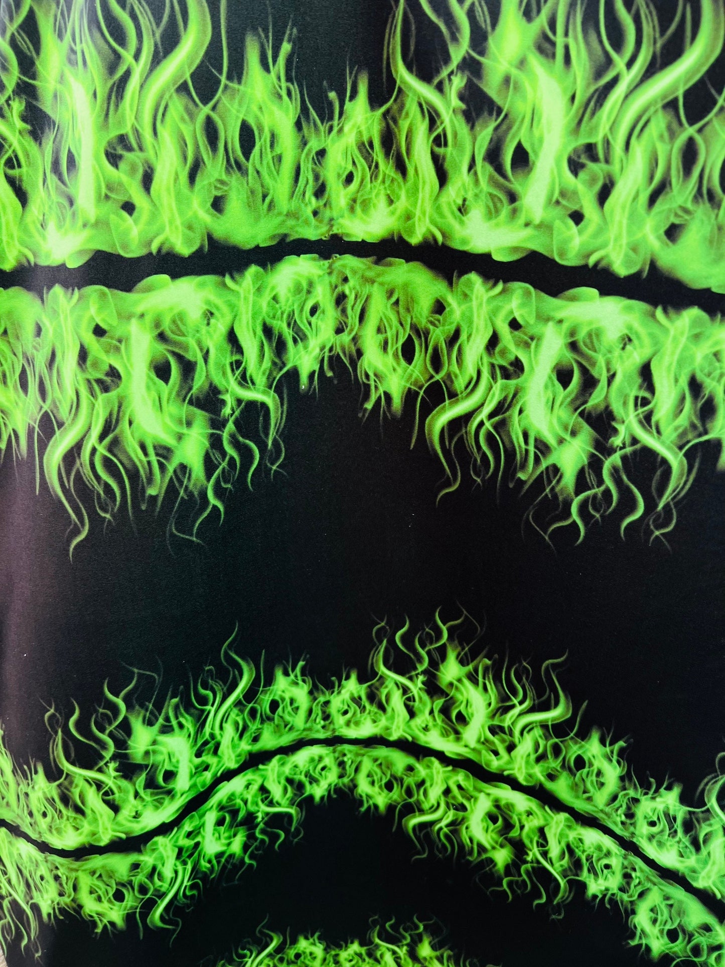 Flames design Black/Green print on great quality of nylon spandex 4-way stretch 58/60” Sold by the YD. Ships Worldwide from Los Ángeles CA