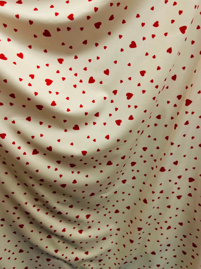 Hearts design print on nylon spandex 4-way stretch 58/60” Sold by the YD. Ships Worldwide from Los Angeles California USA.