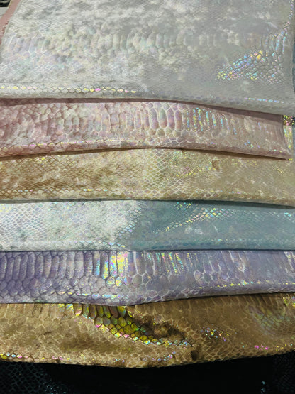 Ilusión Anaconda design crystal iridescent foil on great quality of stretch velvet 4-way stretch 58/60” Sold by the YD. Ships Worldwide