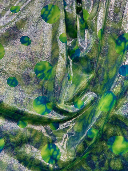 Water design Blue/green foiled print on nylon spandex with silver foil 4-way stretch 58/60” Sold by the YD. Ships Worldwide