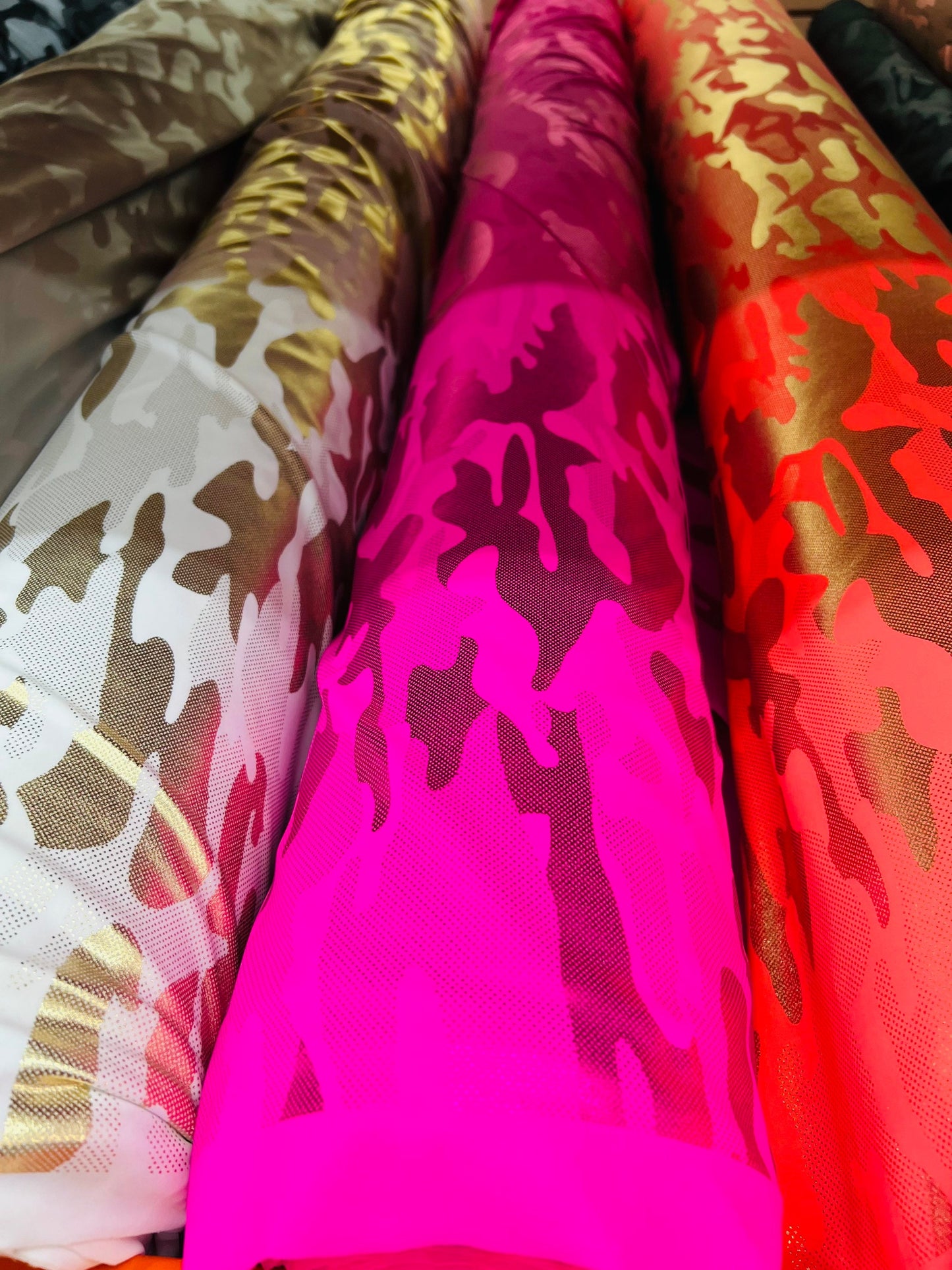 Camouflage design metallic nylon spandex 4-way stretch 58/60” Sold by the YD. Ships Worldwide from Los Angeles California USA.