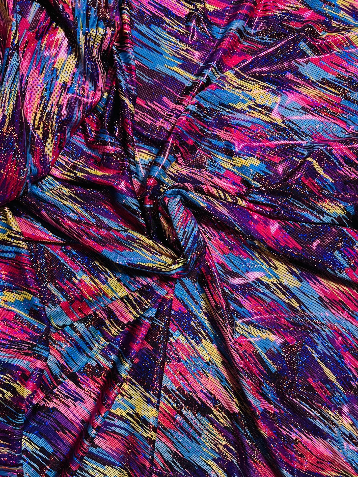 New Hologram abstract paint design metallic nylon spandex 4-way stretch 58/60” Sold by the YD. Ships Worldwide from Los Angeles California