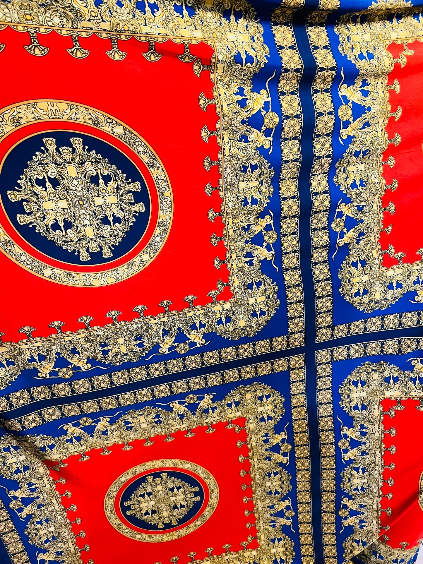 New brand fashion design sapphire/red/gold print on poly spandex light weight 2-way stretch 58/60” Sold by panel 32”