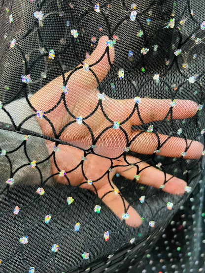 Oval design flocking glitter stretch mesh one way stretch 58/60”  Sold by the YD. Ships Worldwide from Los Angeles California USA