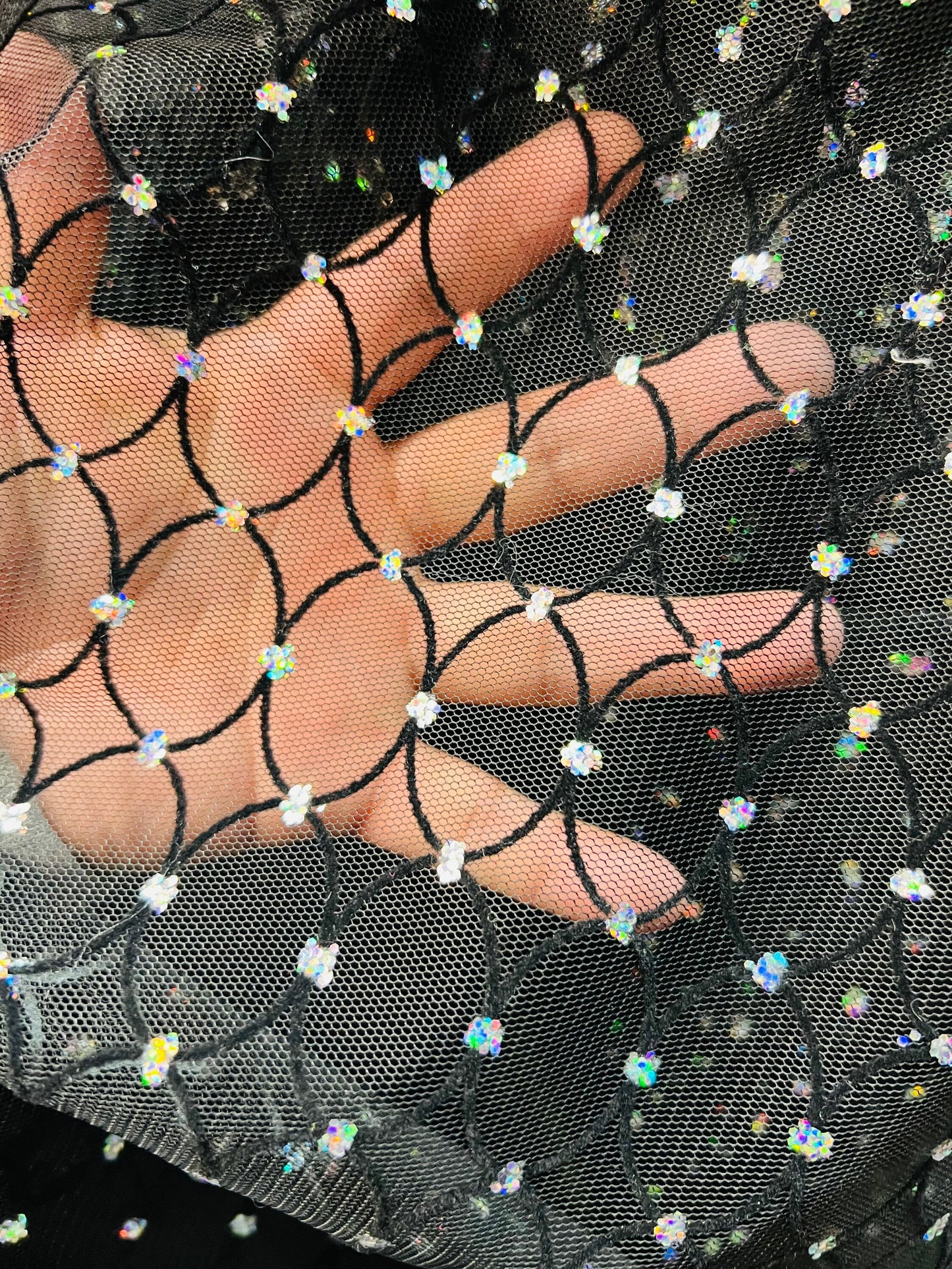 Oval design flocking glitter stretch mesh one way stretch 58/60”  Sold by the YD. Ships Worldwide from Los Angeles California USA