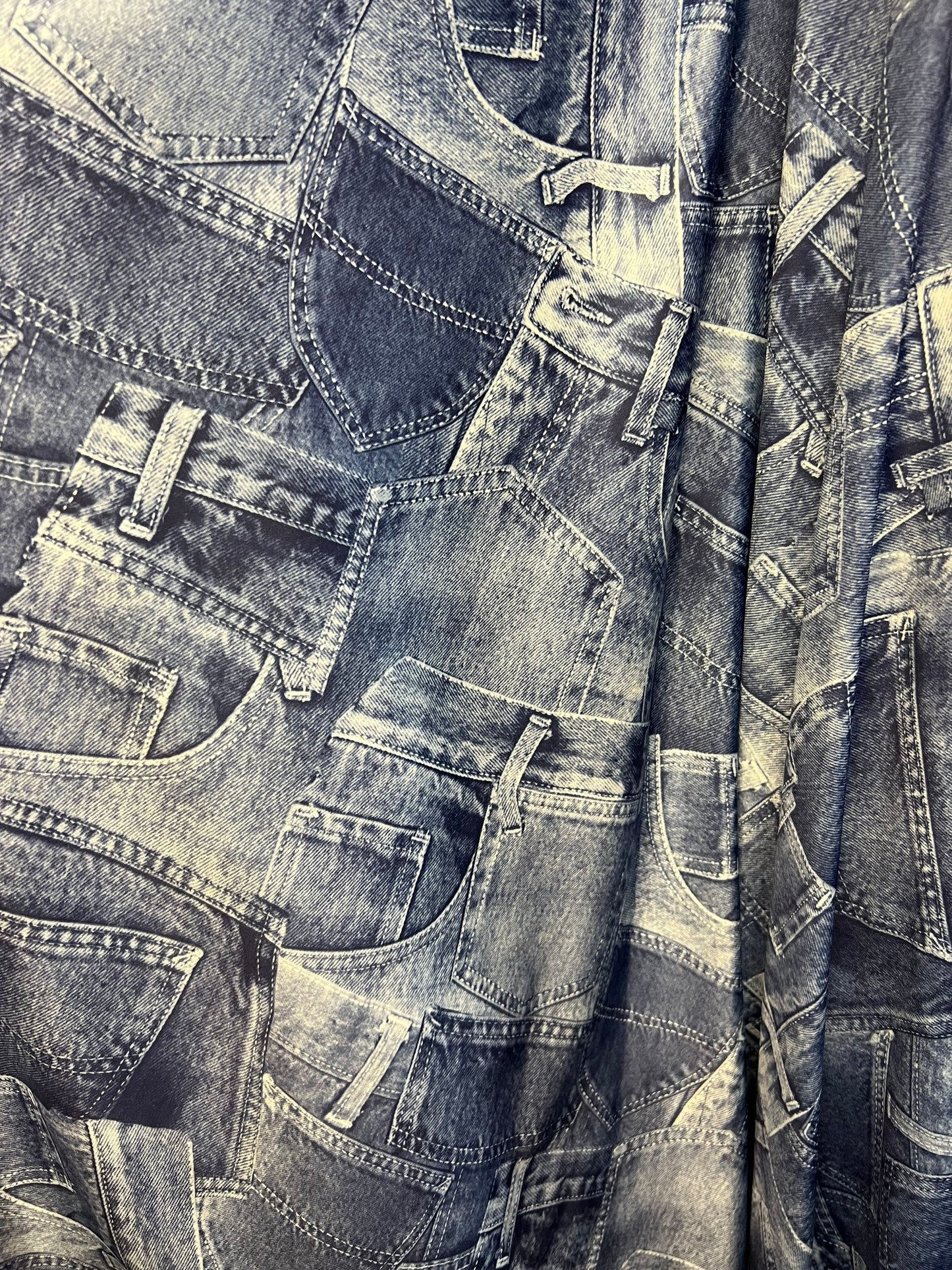 Jeans pocket design print on poly spandex 4-way stretch medium weight 58/60” Sold by the YD. Ships Worldwide from Los Ángeles California USA